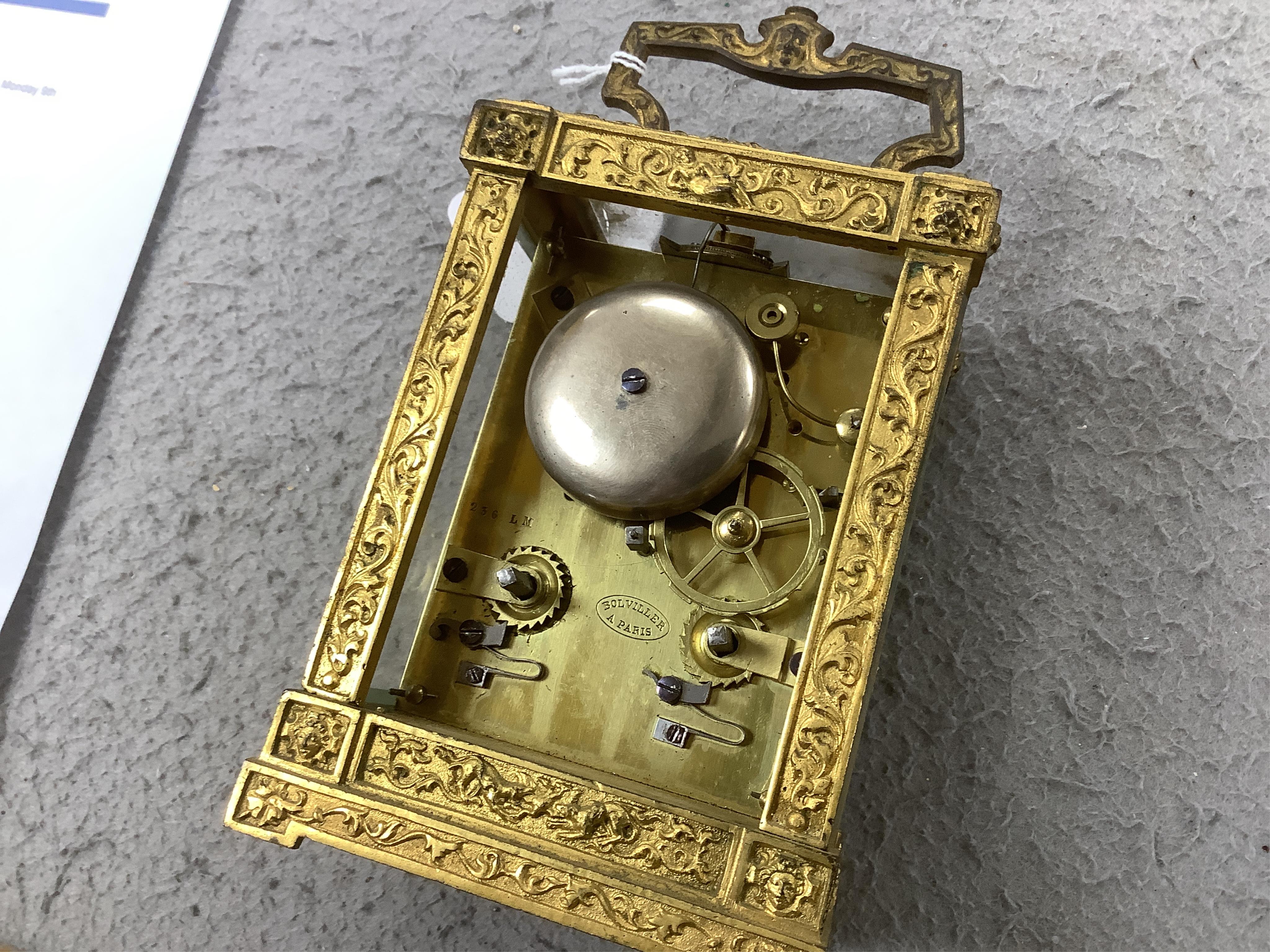 A 19th century French fancy ormolu cased carriage clock, movement requires work, 13cm high. Condition - dial marked, gilding tarnished in places